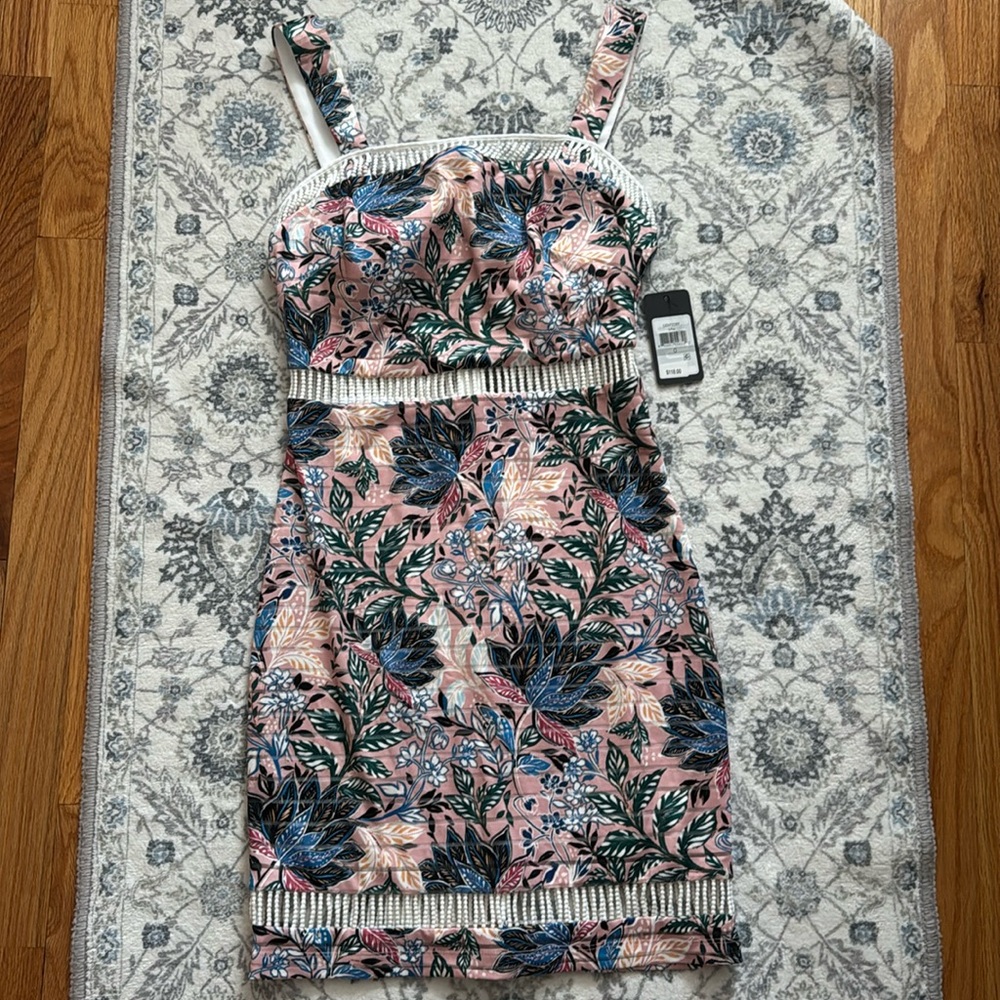 Floral dress from Guess. Size zero. New with tag. Super cute.